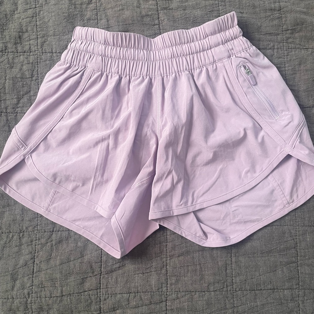 Lululemon track that style light purple running shorts size 4